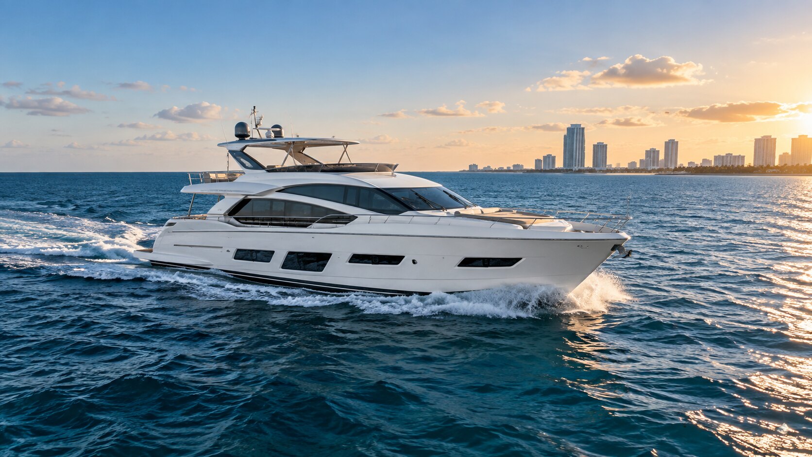 Modern luxury yacht cruising on blue water near the South Florida coastline